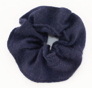 Gentle on Hair, Strong in Hold: Wrap your hair in the softness of cashmere without compromising on strength.  California Craftsmanship: Ethically made in California, our scrunchies feature sustainable cashmere from Mongolian goat herders.  Hand-Dyed Yarn: Choose from a variety of hand-dyed colors, making it a stylish and personalized gift, this one is navy