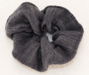 Gentle on Hair, Strong in Hold: Wrap your hair in the softness of cashmere without compromising on strength.  California Craftsmanship: Ethically made in California, our scrunchies feature sustainable cashmere from Mongolian goat herders.  Hand-Dyed Yarn: Choose from a variety of hand-dyed colors, making it a stylish and personalized gift, this one is charcoal grey