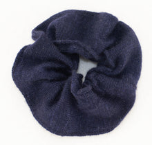 Load image into Gallery viewer, Gentle on Hair, Strong in Hold: Wrap your hair in the softness of cashmere without compromising on strength.  California Craftsmanship: Ethically made in California, our scrunchies feature sustainable cashmere from Mongolian goat herders.  Hand-Dyed Yarn: Choose from a variety of hand-dyed colors, making it a stylish and personalized gift, this one is navy