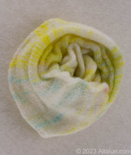 Load image into Gallery viewer, Gentle on Hair, Strong in Hold: Wrap your hair in the softness of cashmere without compromising on strength.  California Craftsmanship: Ethically made in California, our scrunchies feature sustainable cashmere from Mongolian goat herders.  Hand-Dyed Yarn: Choose from a variety of hand-dyed colors, making it a stylish and personalized gift, this one is yellow with specks of green, blue, pink on a white cashmere. 